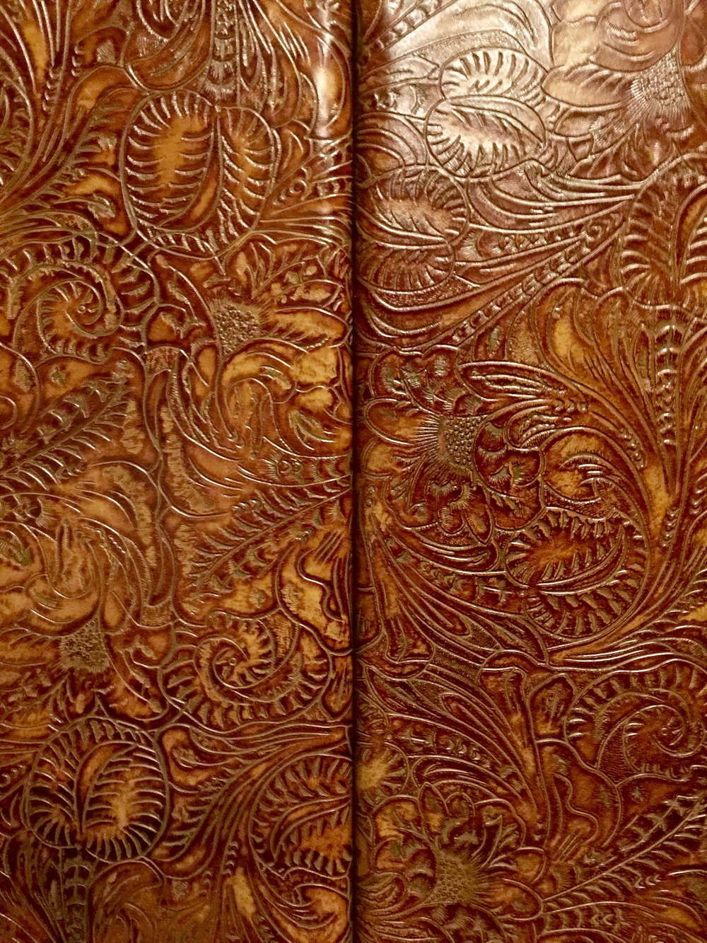 Tooled leather panels - Hotel Emma elevator cab