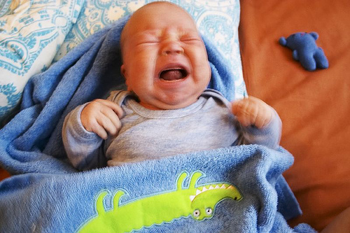 Tiny infant, bawling