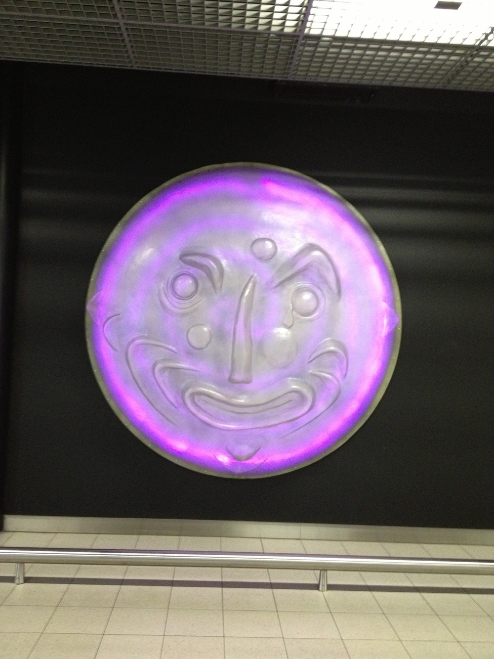 The Amsterdam airport is bustling and full of life- even at 6AM when I got there.  I spotted this glowing purple face on the wall and it really reminded me of someone... I think it's the actor in Curb Your Enthusiasm.  What do you think?