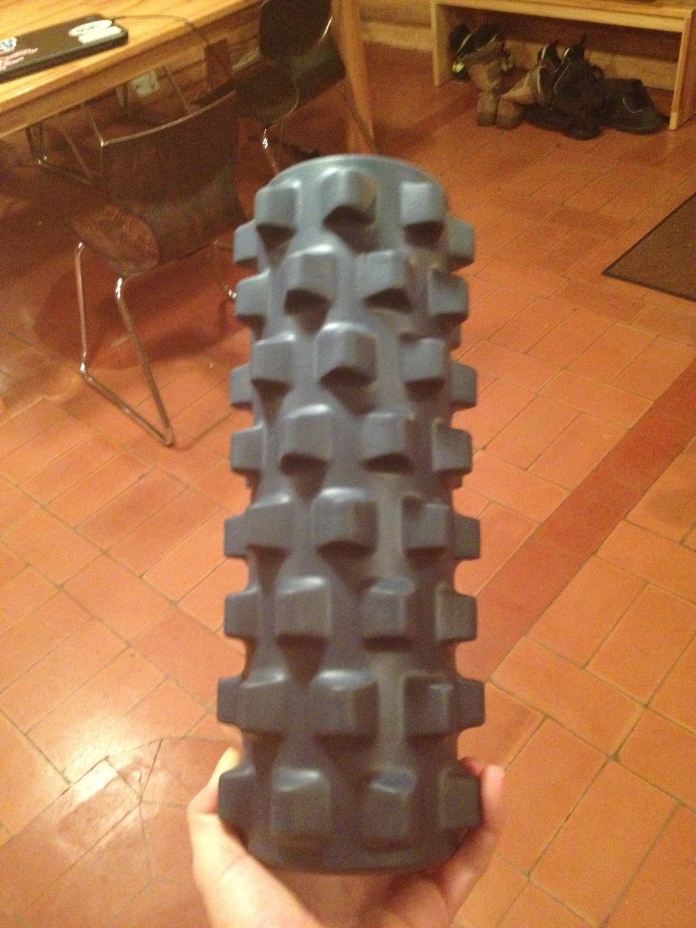 Jennie's torture-rolling device. I suppose those knobby bits are good for your muscles, but...