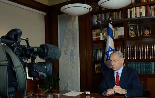 Click photo to download. Caption: Israeli Prime Minister Benjamin Netanyahu gives a television interview from his office in Jerusalem on March 5, 2015. Credit: Haim Zach/GPO.