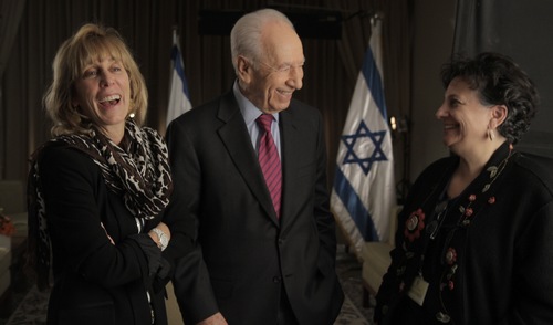 Click photo to download. Caption: Former Israeli president Shimon Peres (center) with "Above and Beyond" producer Nancy Spielberg (left) and director Roberta Grossman (right). Credit: Above and Beyond.