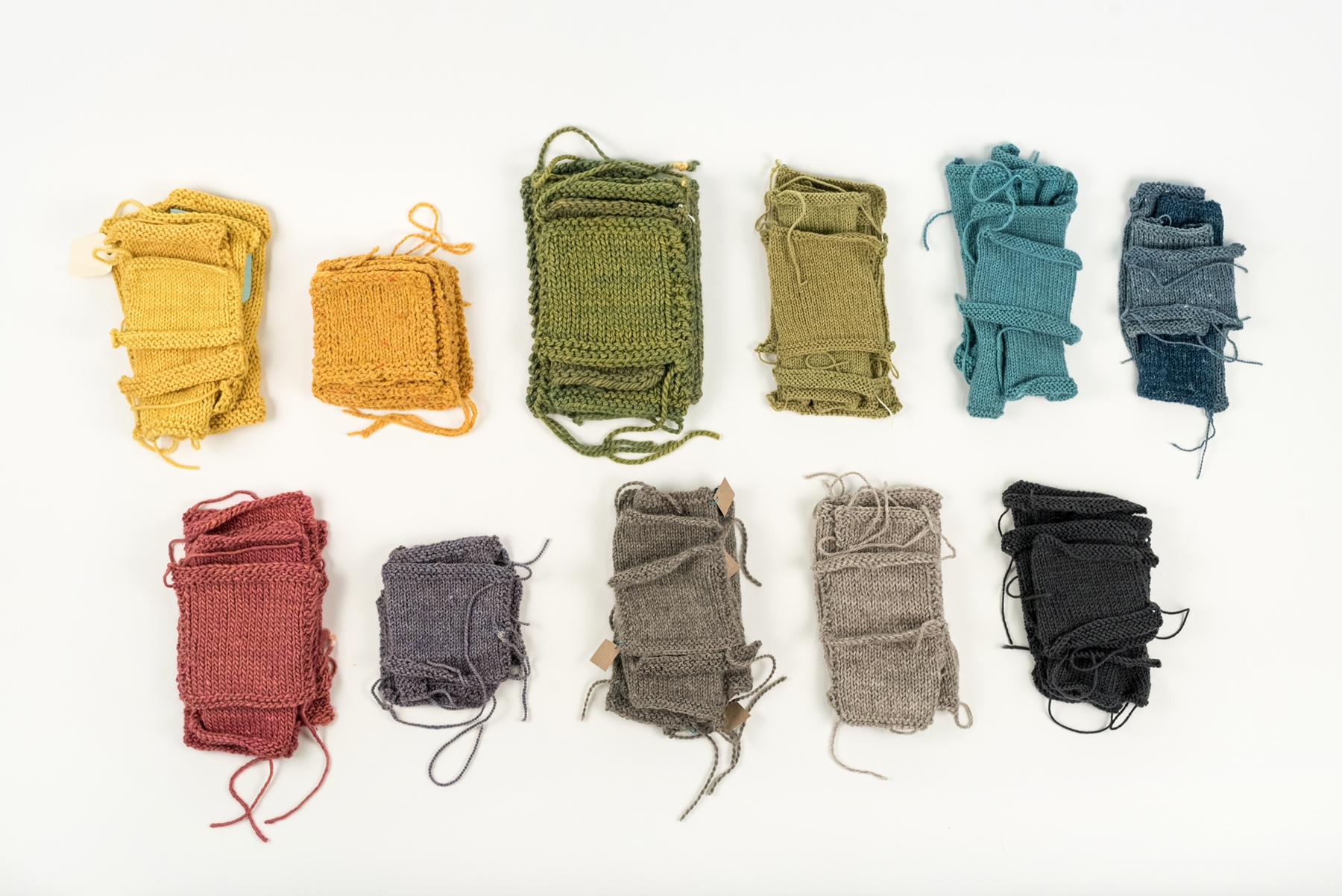 Top row, l to r: Canopy Worsted, Arranmore, Tundra, Canopy Fingering, Road to China Light, Meadow. Bottom row, l to r: Terra, Acadia, Knightsbridge, Cumbria, Cumbria Fingering.