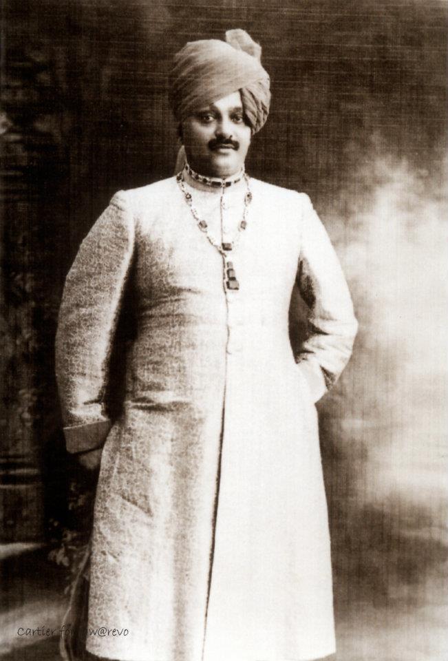 Maharajah of Nawanagar wearing the emerald and diamond necklace created by Cartier in 1926, Cartier Archives.