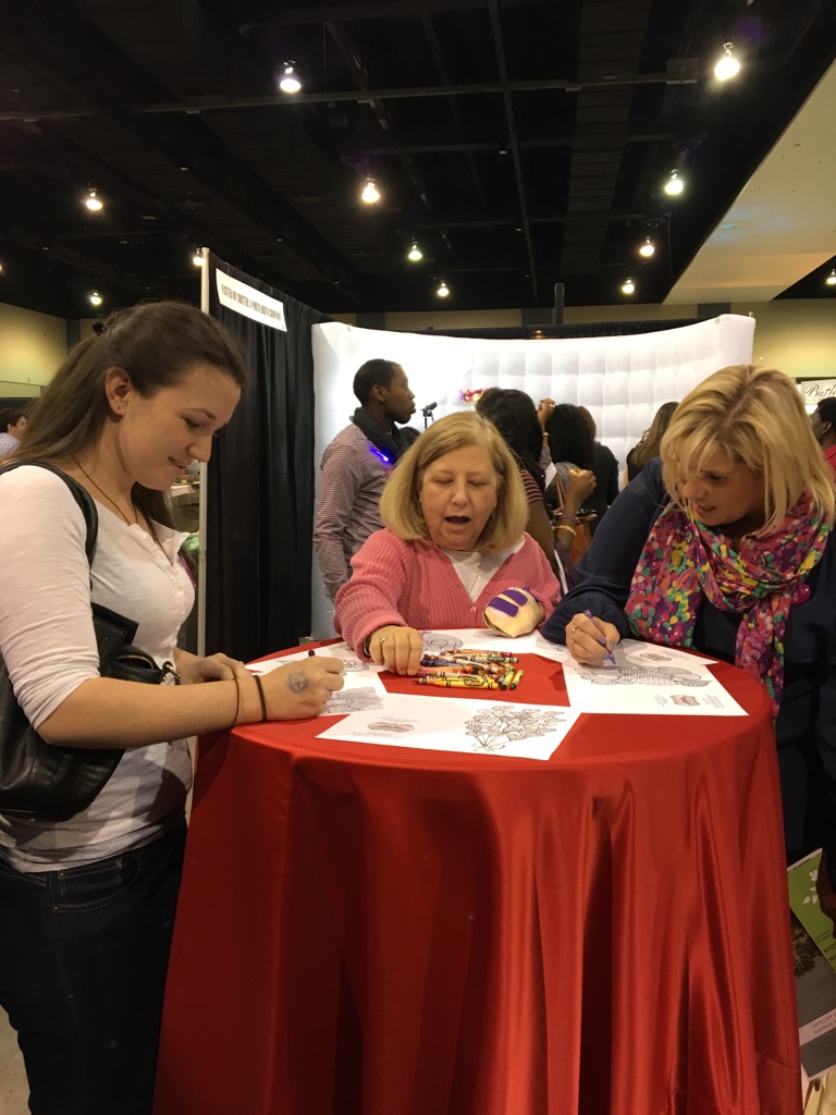 Richmond Wedding Experience attendees enjoying the Storybook Events Coloring Book.