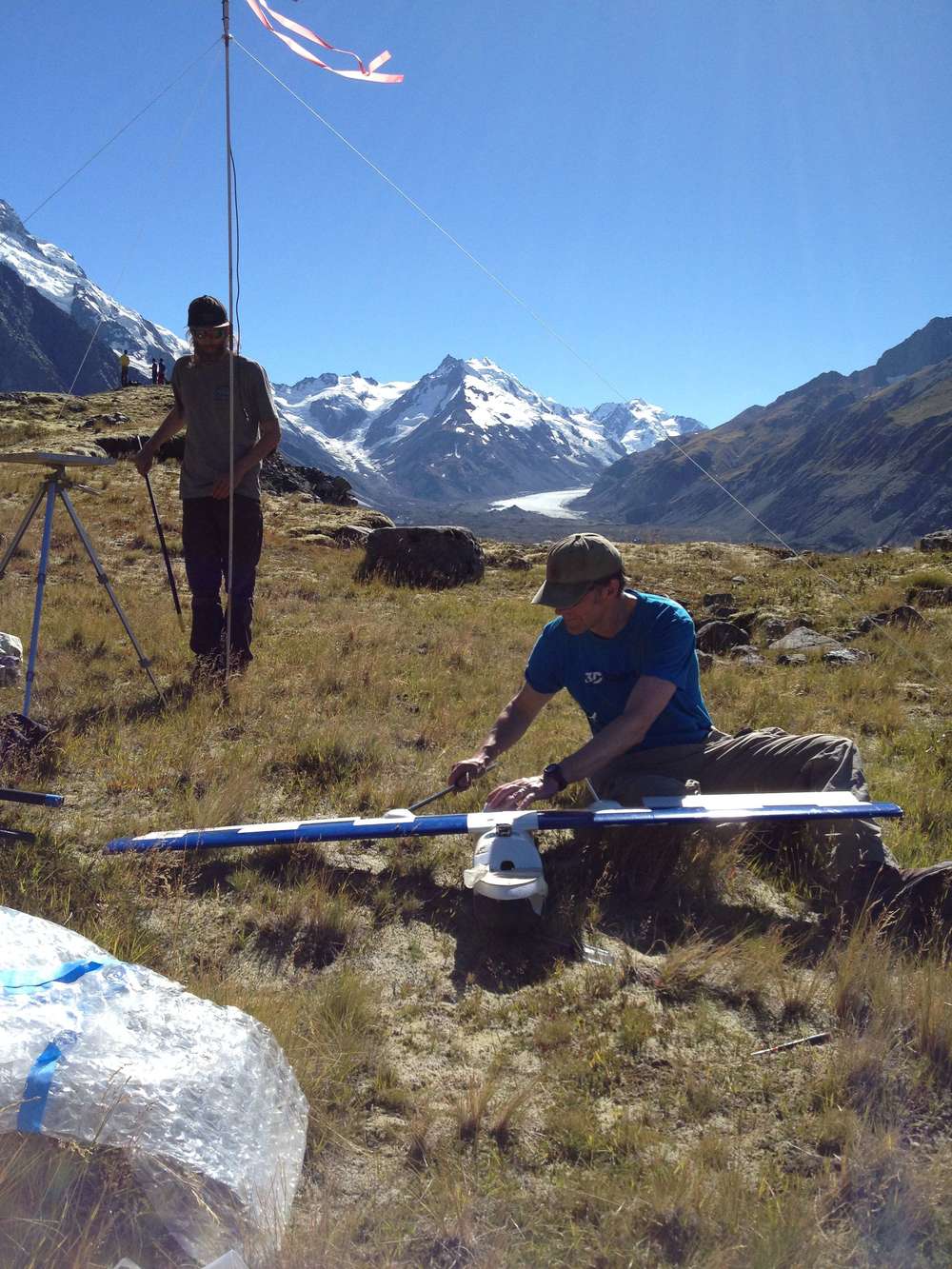 Brian setting up the ground station, and Tom adding the tail to the Sky Hunter.
