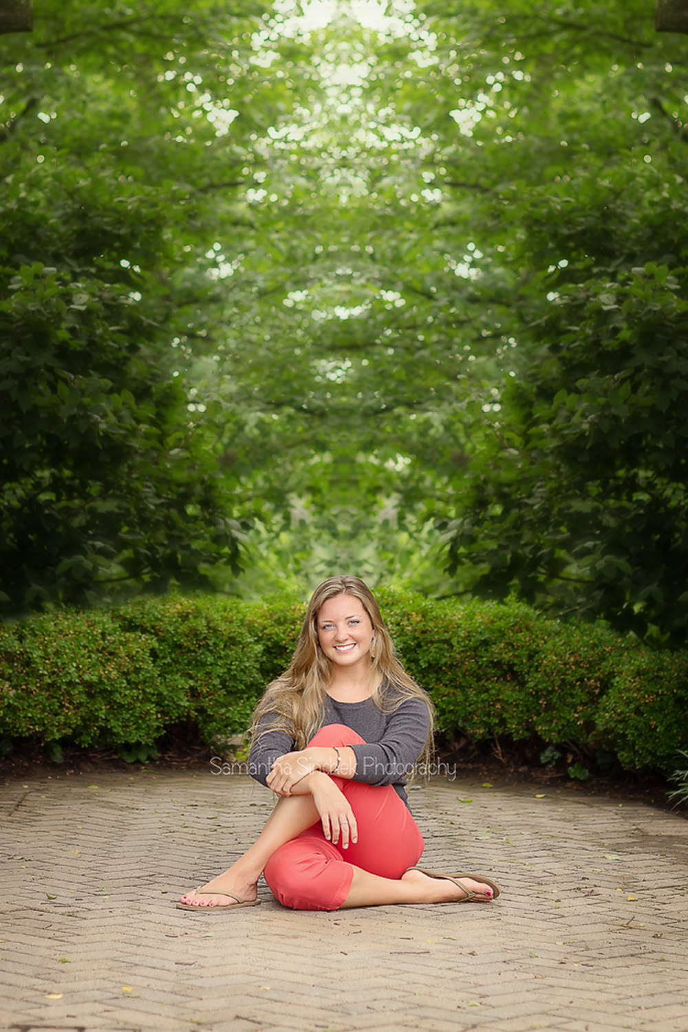 alyssa sits in a gazebo at Ault Park for a SENIOR PHOTO SESSION