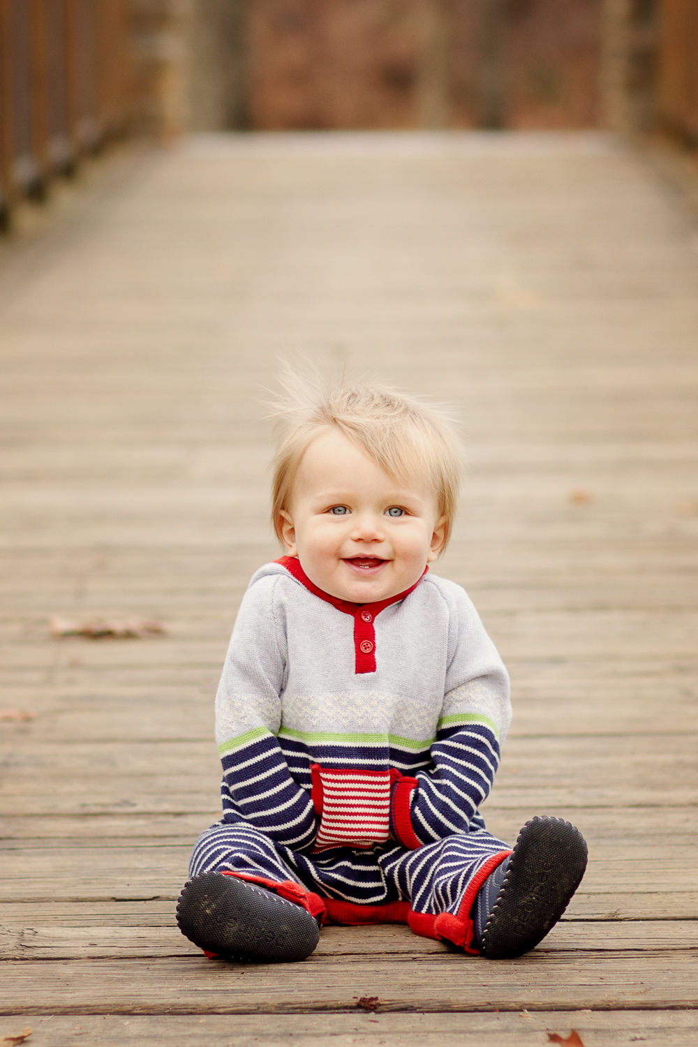 toddler boy laughs at Sharon Woods Park in Cincinnati Ohio 