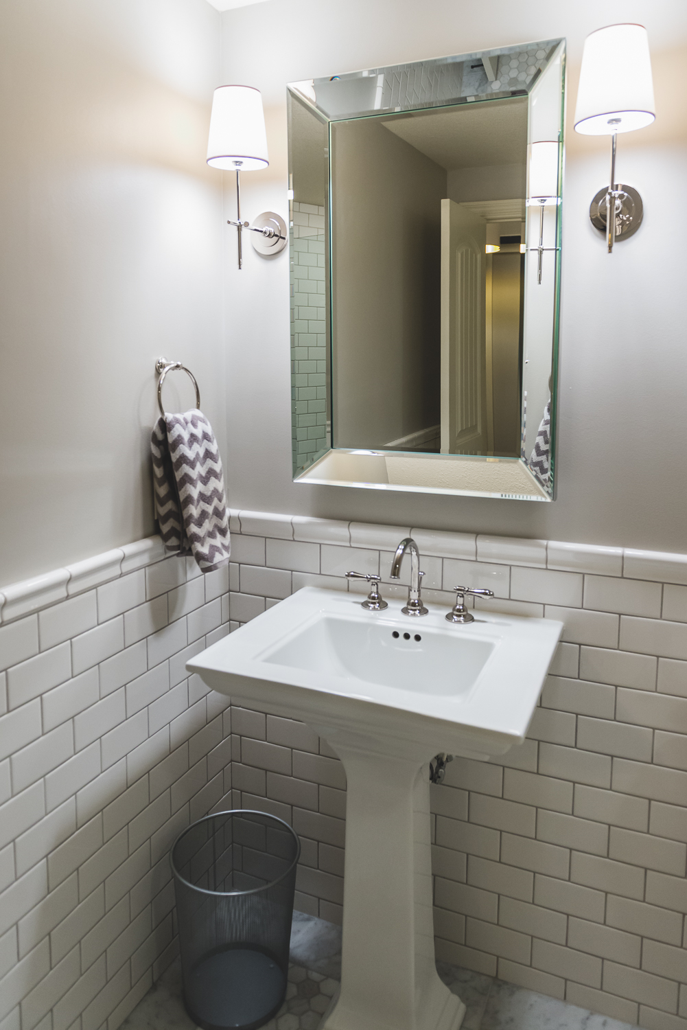 The classic bathroom is a perfect addition for the space.  www.saranobledesigns.com
