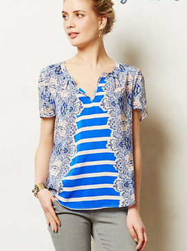 This Anthropologie Archivist tee is the perfect short-sleeved option; made from super light, silky breathable fabric. The pattern is perfect to pair with a white slack or a colorful skirt/pant