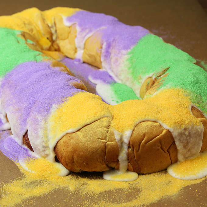   Named after the biblical three kings, the king cake is baked to honor them as part of a French tradition that was brought to New Orleans in 1870. As part of the celebration, a small plastic baby is often hidden inside the cake to represent luck and prosperity for those who find it.  