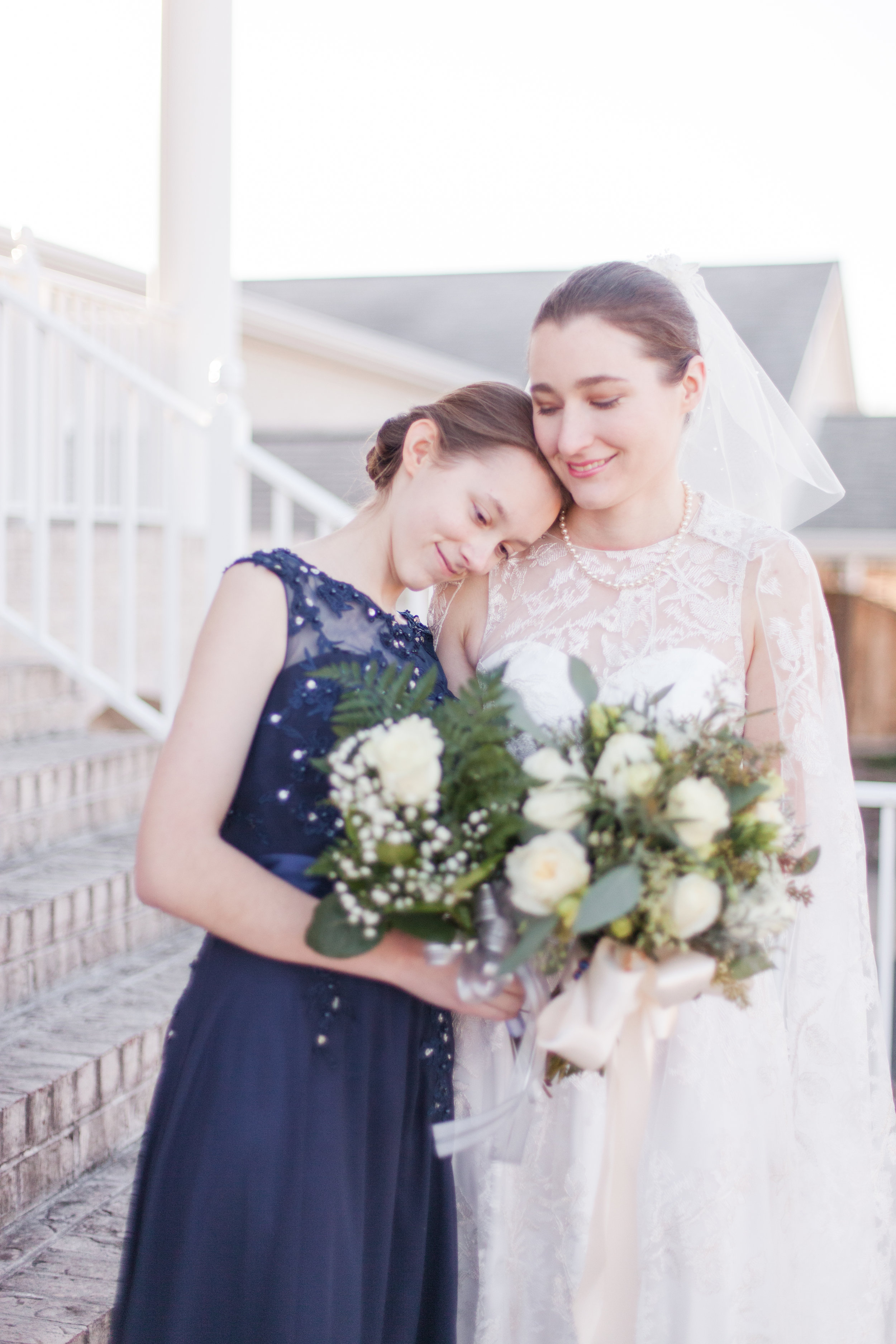  bride and her little sister winter wedding bridesmaid 
