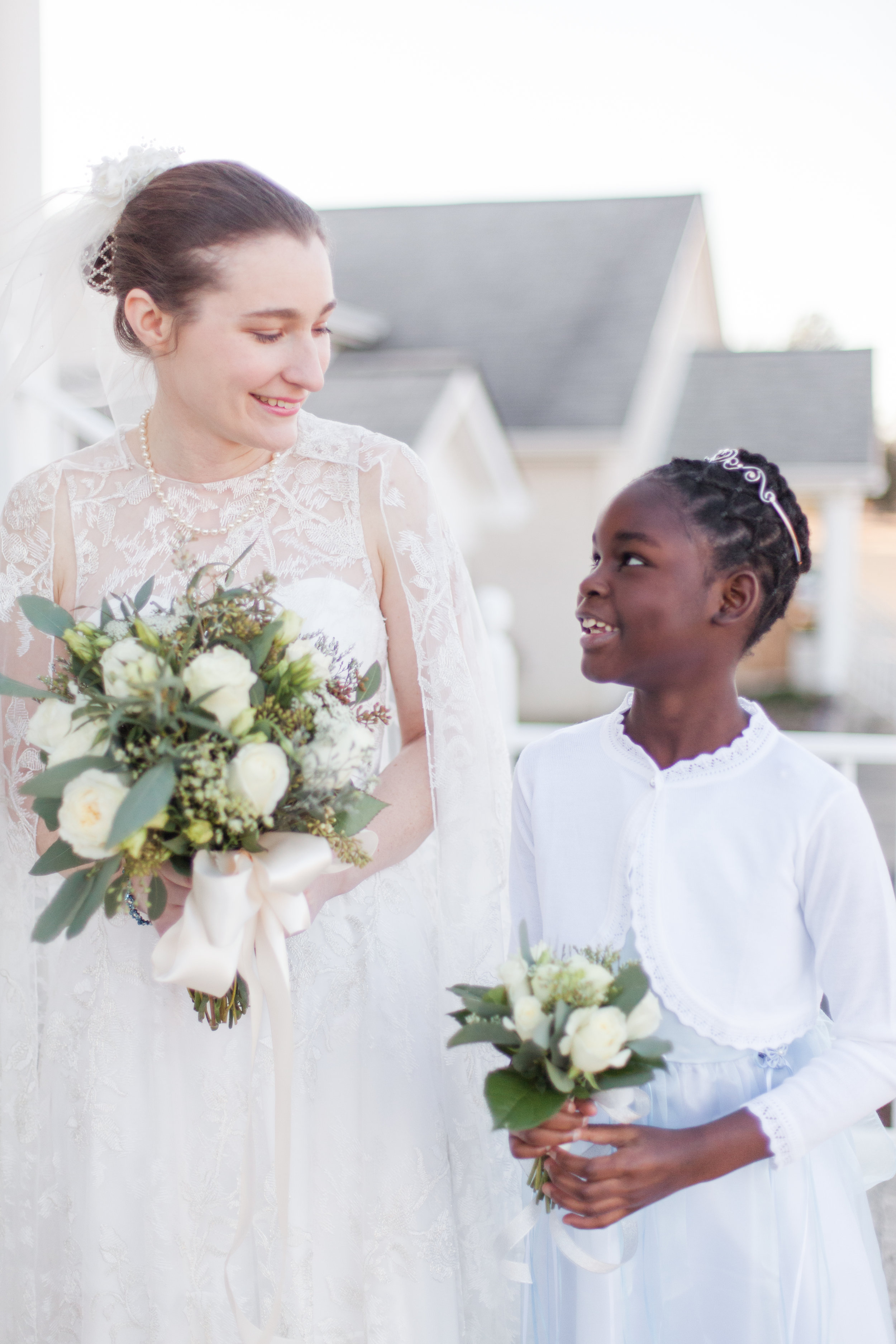  bride with flower girl 