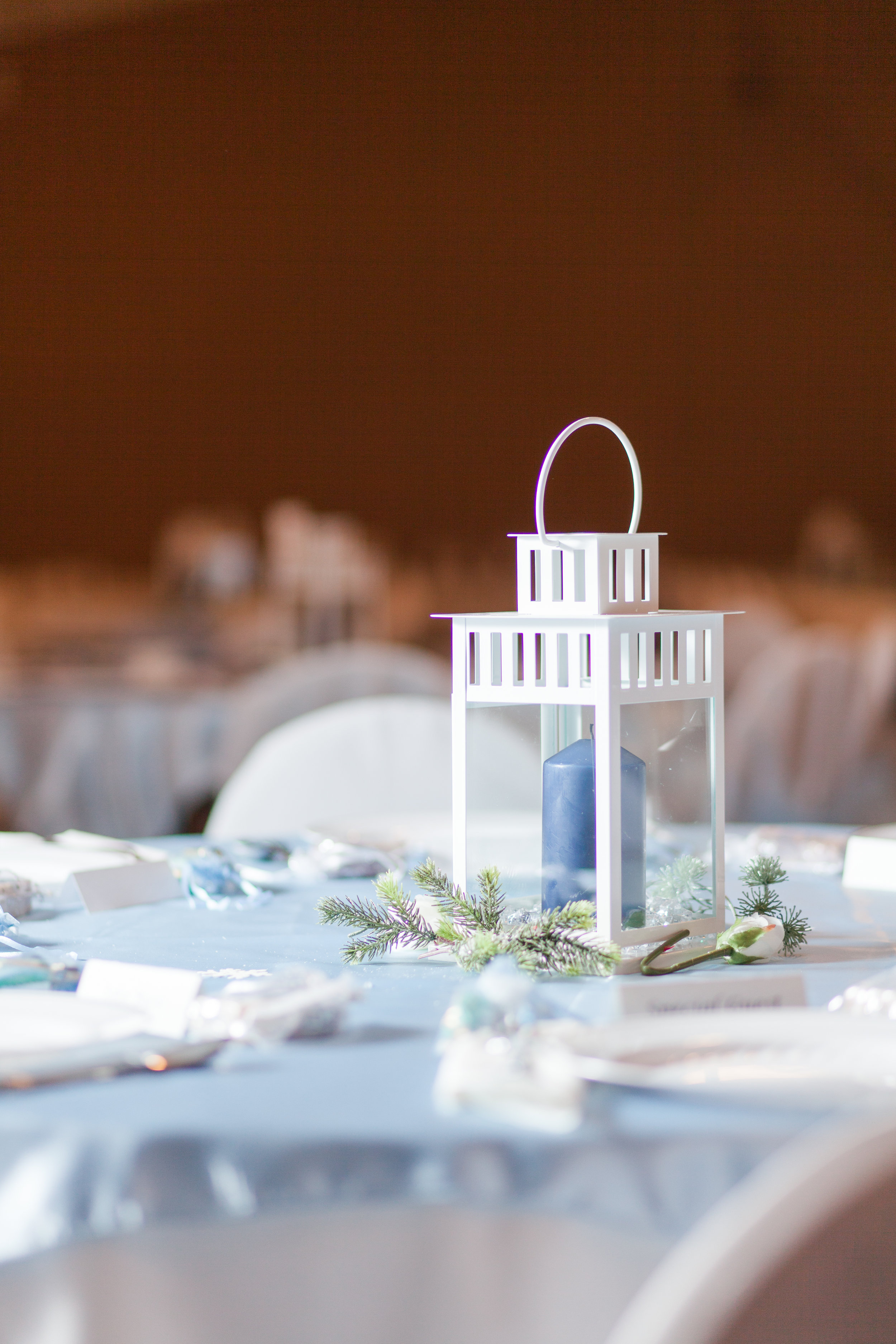  winter lantern wedding decoration with pine and glitter table setting, centerpiece 