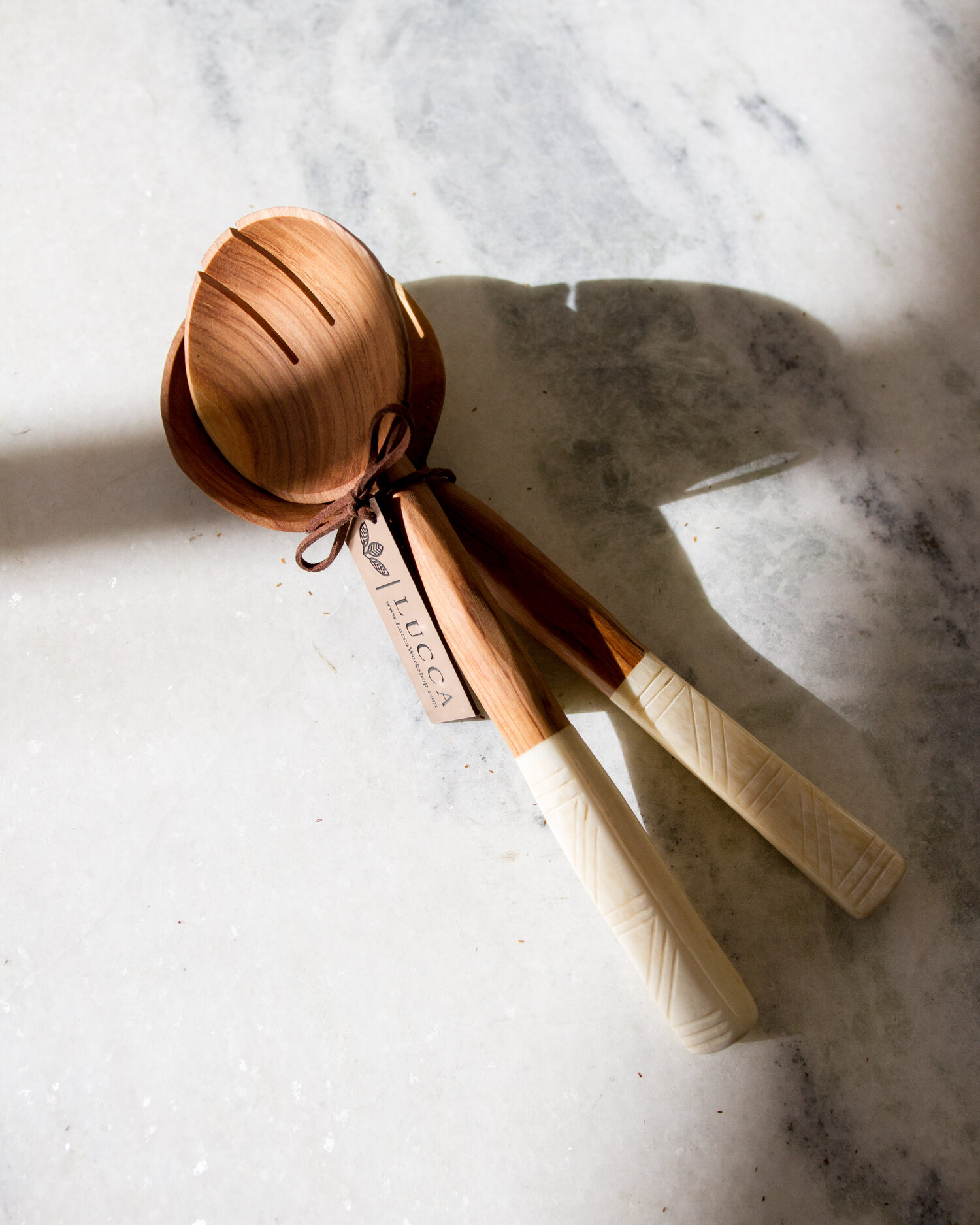 Shop Olive Wood + Bone Serving Utensils from Lucca on Openhaus