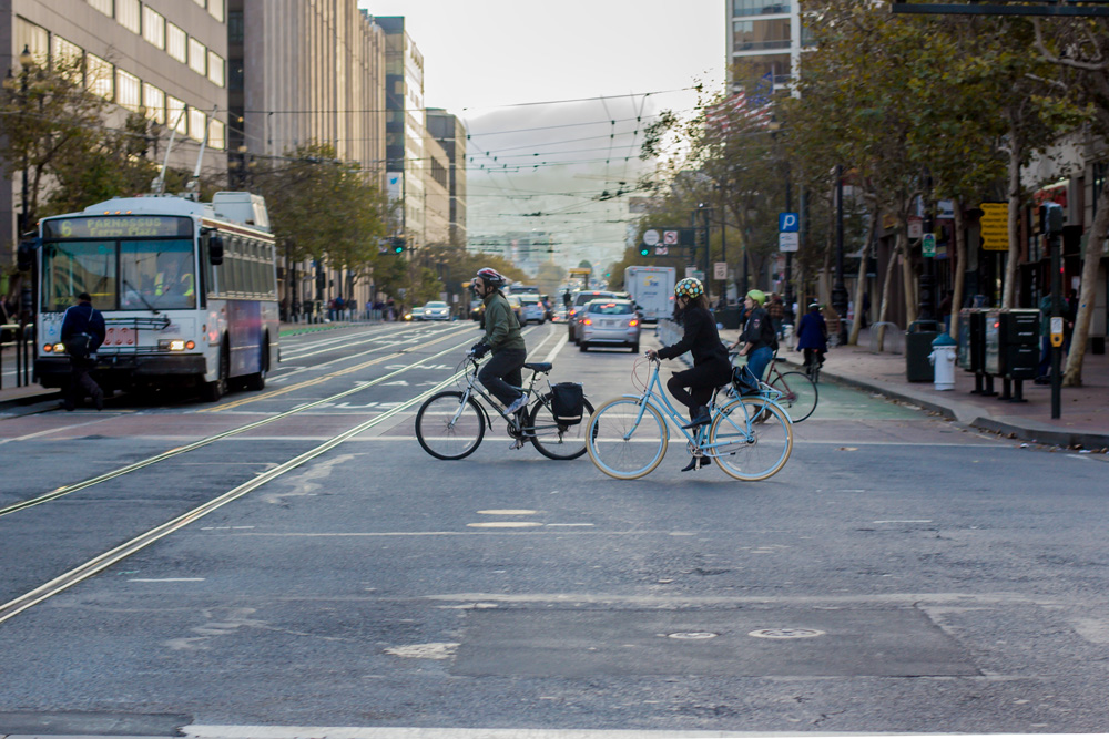 Bike commuter crossing Market Street in San Francisco
