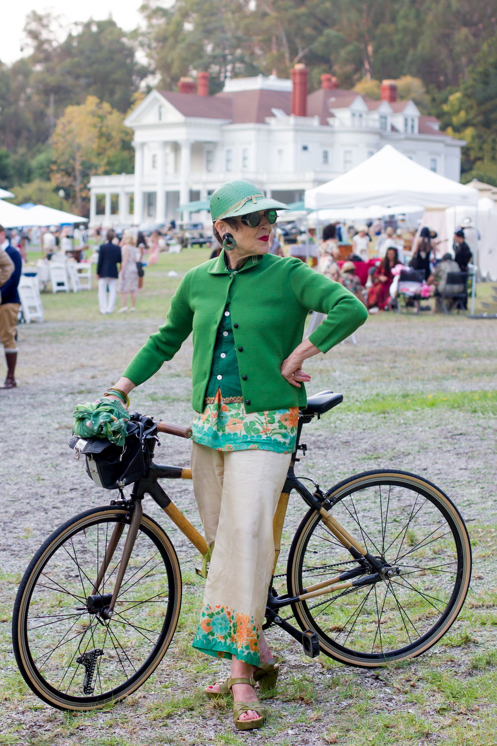 Advanced Style star Tziporah Salamon with a bamboo bike at the Gatsby Summer Afternoon picnic.