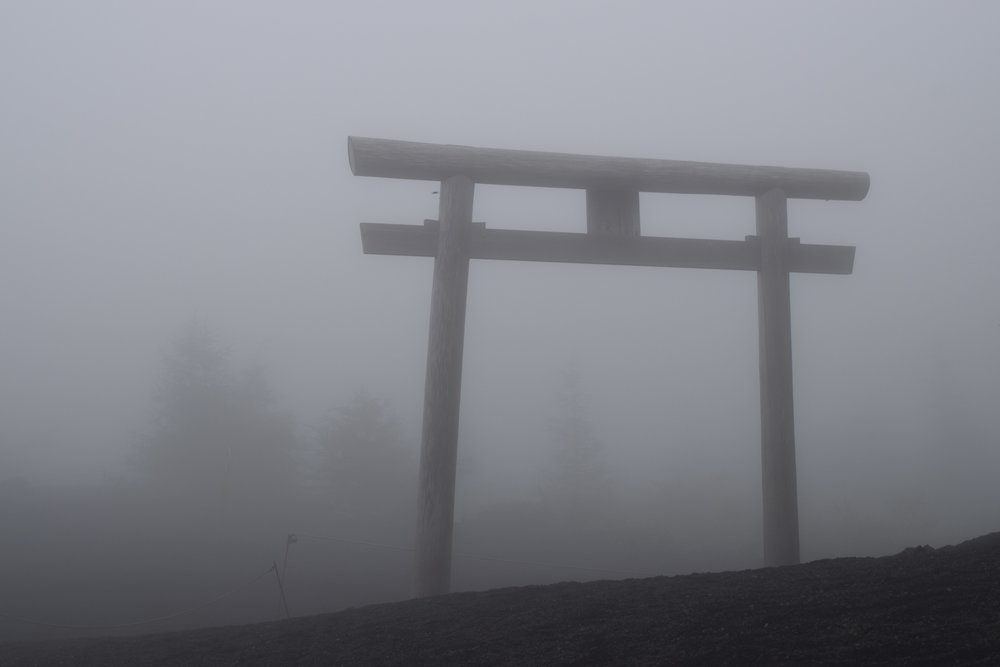  The first  torii . The next would be at the top. Luckily the clouds didn’t last! 