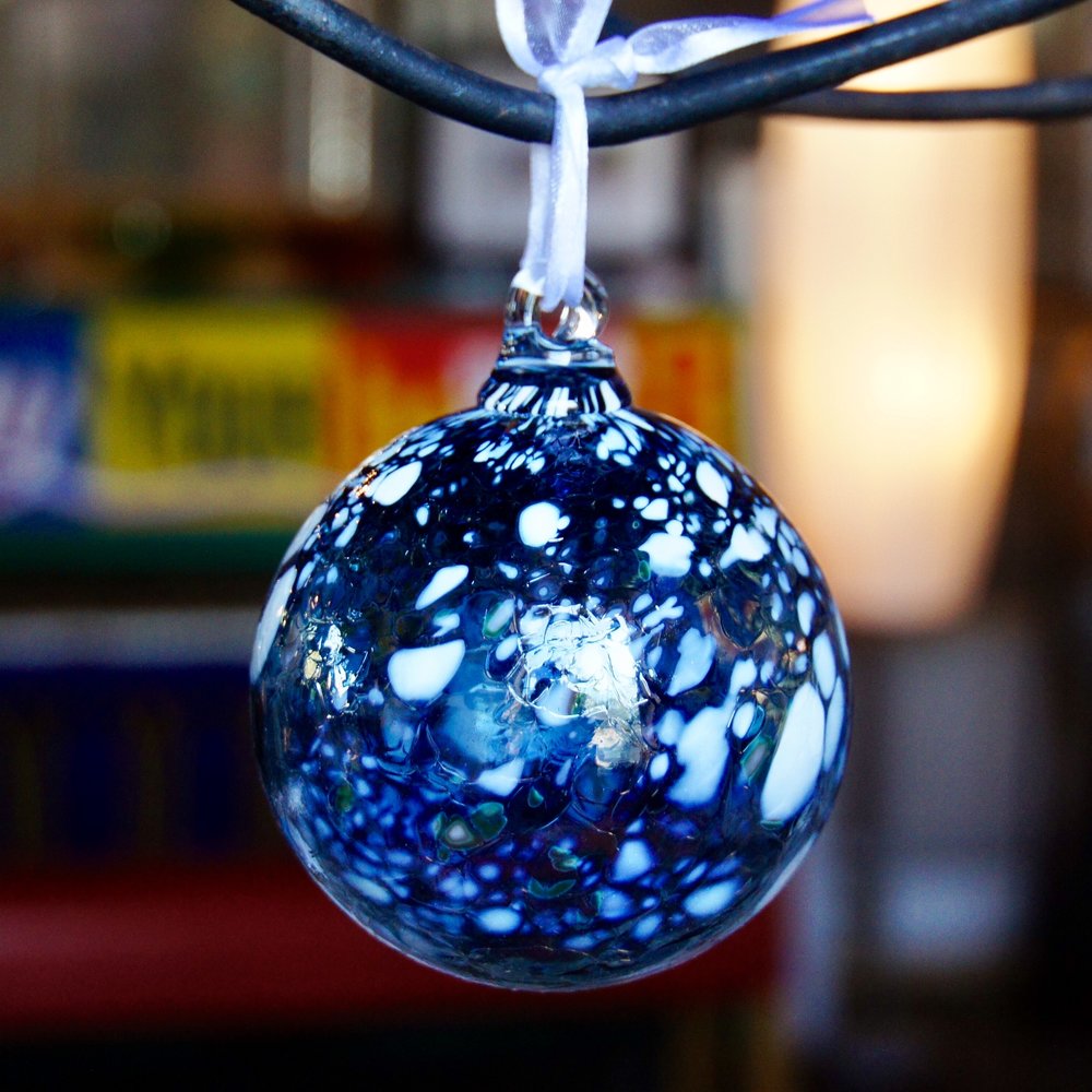 Blue gumball blown glass ornament.