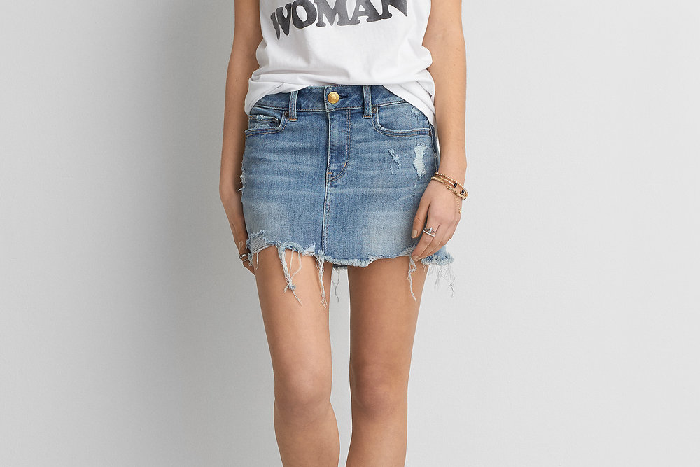  A distressed denim mini to go with just about anything all summer long!   
