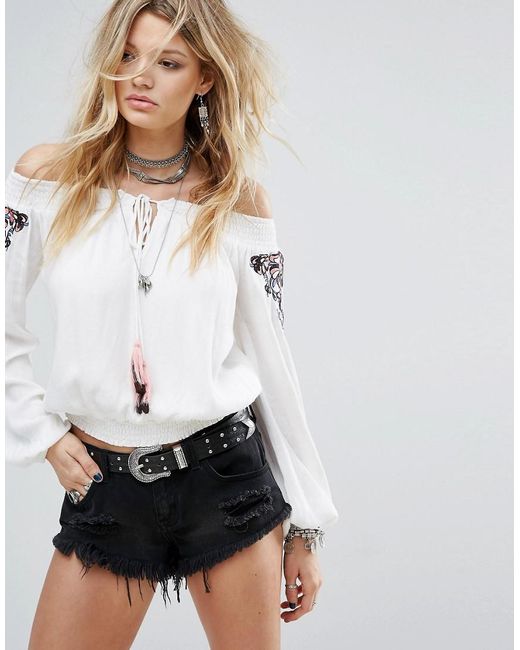  K, this top is perfect for the Stampede but I am kind of obsessed with this model and her whole outfit in general! 