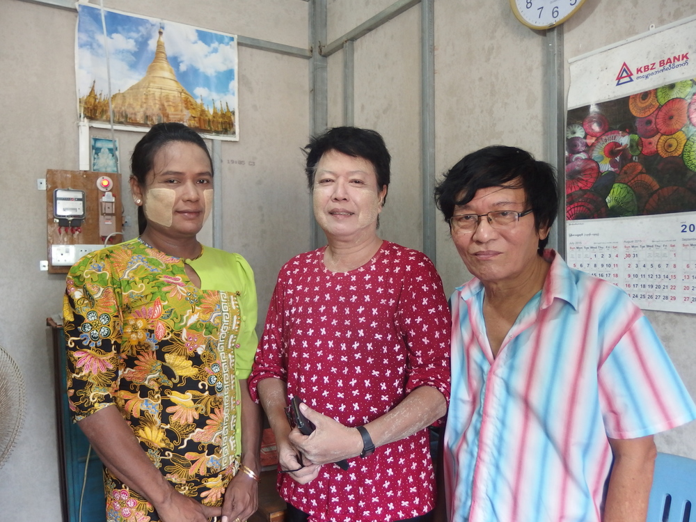 The senior staff inside the vocational centre's office, from right: Dr Myint Maw, trainer Ko Zaw, and training assistant Ma Mya Aye