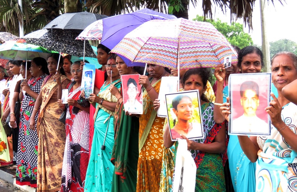FAMILIES OF MISSING TAMIL PEOPLE IN THE JAFFNA, SRI LANKA STAGED A PROTEST IN DECEMBER 2015 TO EXPRESS THEIR DISAPPOINTMENT WITH A PRESIDENTIAL COMMISSION ON DISAPPEARANCES IN THE COUNTRY. IMAGE COURTESY OF TAMIL GUARDIAN. 