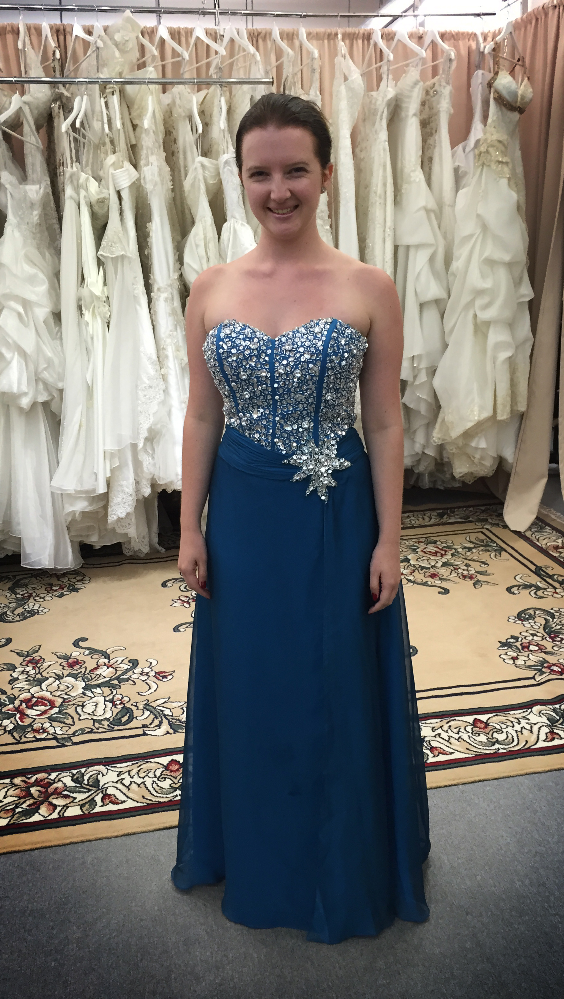  Emily had her dress taken in with beading, and we had it turn around in a day, she is impressed with the finish and the time frame.  