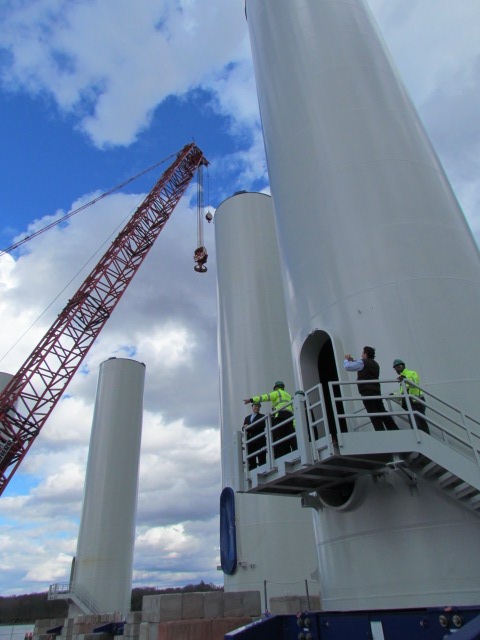 VIPs recently toured the interior of a bottom section of one of the towers for the Block Island Wind Farm, at a staging area on the Providence waterfront. (Tim Faulkner/ecoRI News)