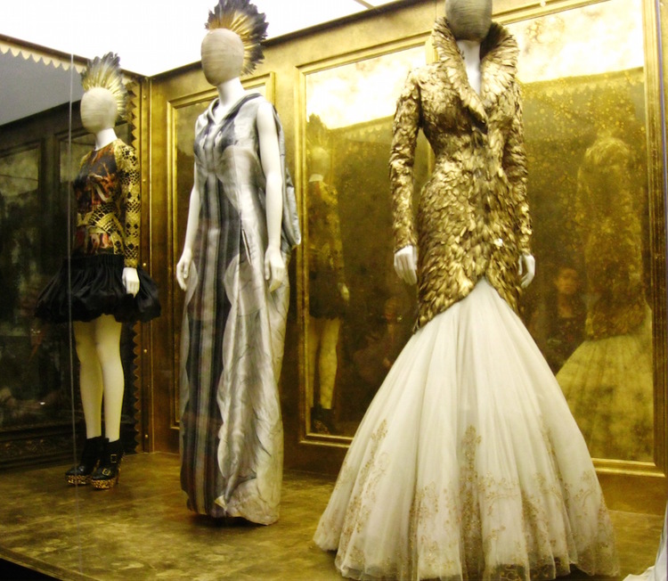 On the right, the inspirational Alexander McQueen feathered coat