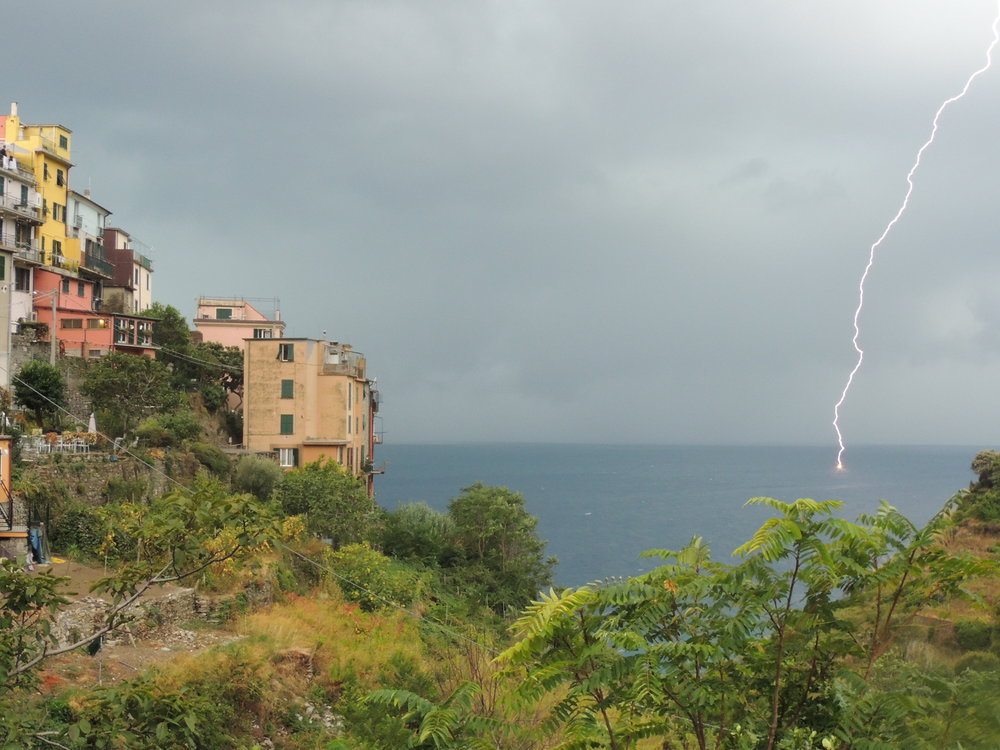  Watching a storm roll in over the sea in Corniglia. Nick caught some great photos of lighting striking the water. 
