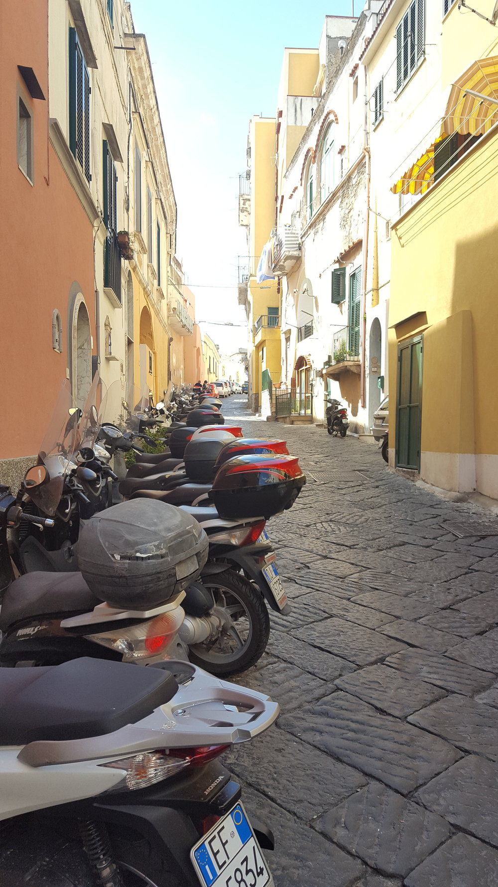  A typical street in Procida - packed with scooters. 