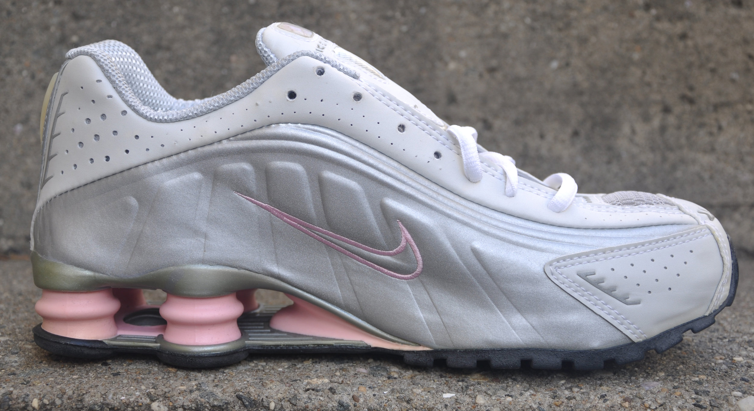 silver and pink nike shox