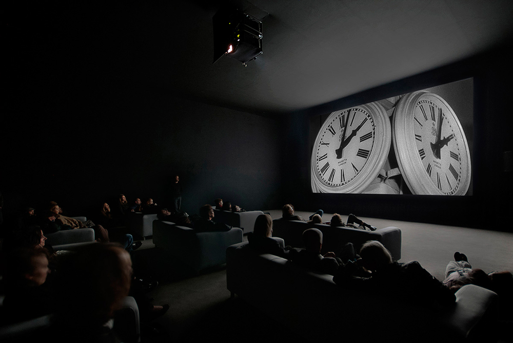 Installation view, The Clock, Christian Marclay
