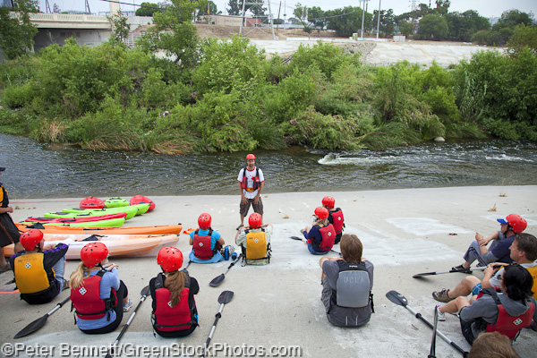 George Wolfe of LA River Expedition goes over safety measures and instructs the day’s travellers on how to paddle and guide their kayaks for their 2.5 mile journey down the river.
