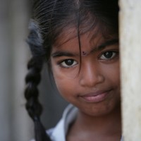 Renu, match factory worker, 5 years old, Tamil Nadu, India. By: Marcus Lyon.