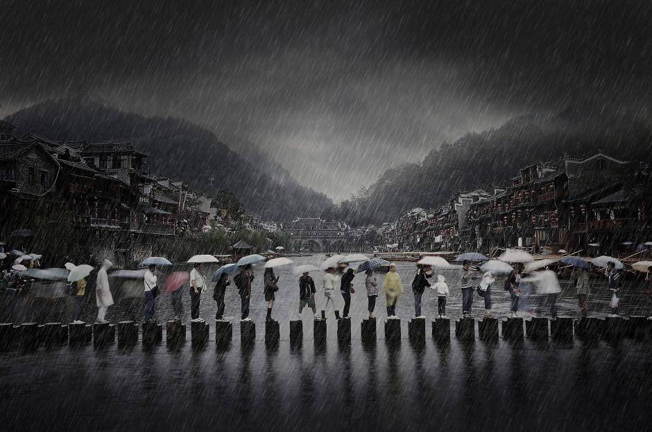 Winner of the Open Category: Chen Li for his 'Rain in an Ancient Town' (Chen Li (China) Winner Open Travel 2014 Sony World Photography Awards)