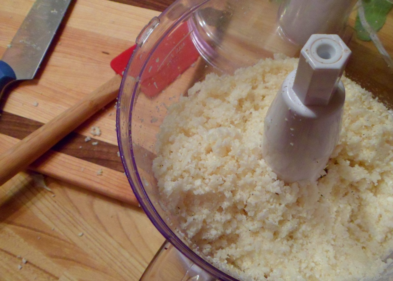 Cauliflower after food processing. Use a regular box grater if you don't have a food processor.