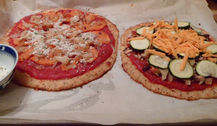 The pizzas before going in the oven.