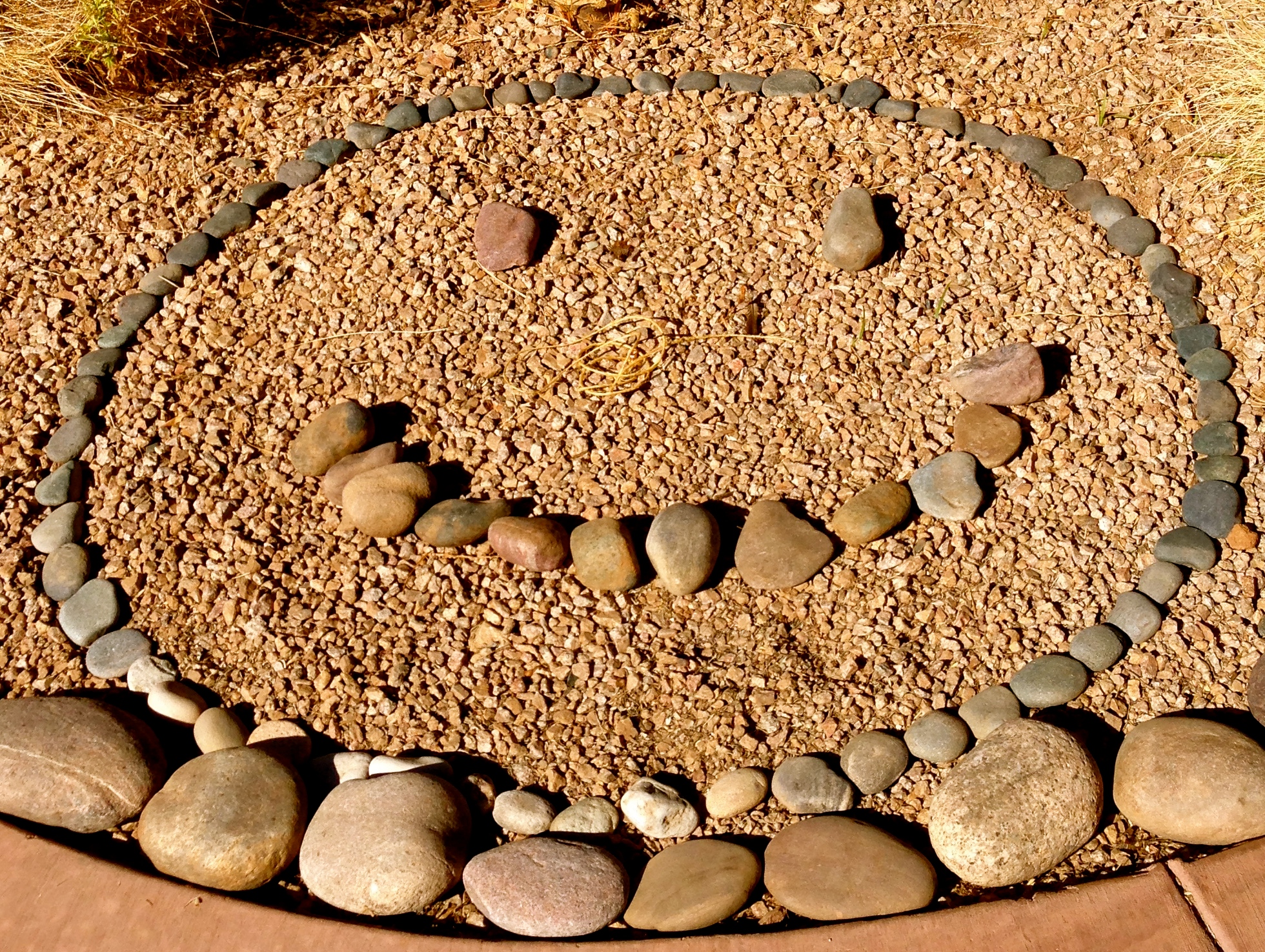 smiley face, rocks