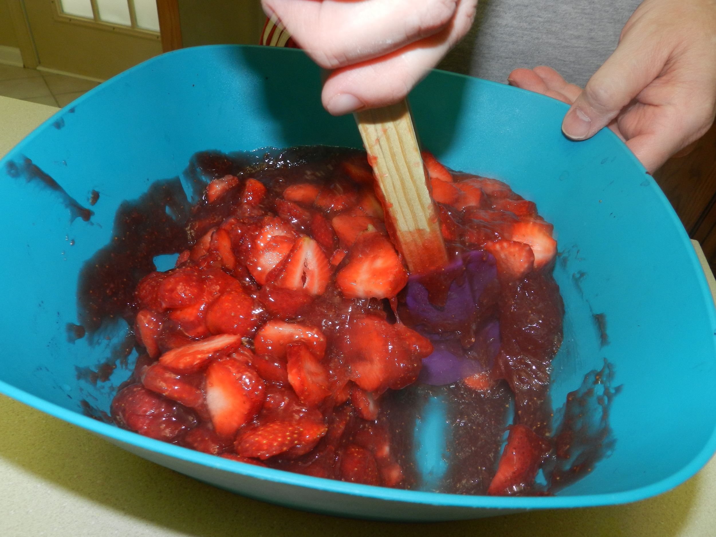Mixing Sliced and Cooked Berries