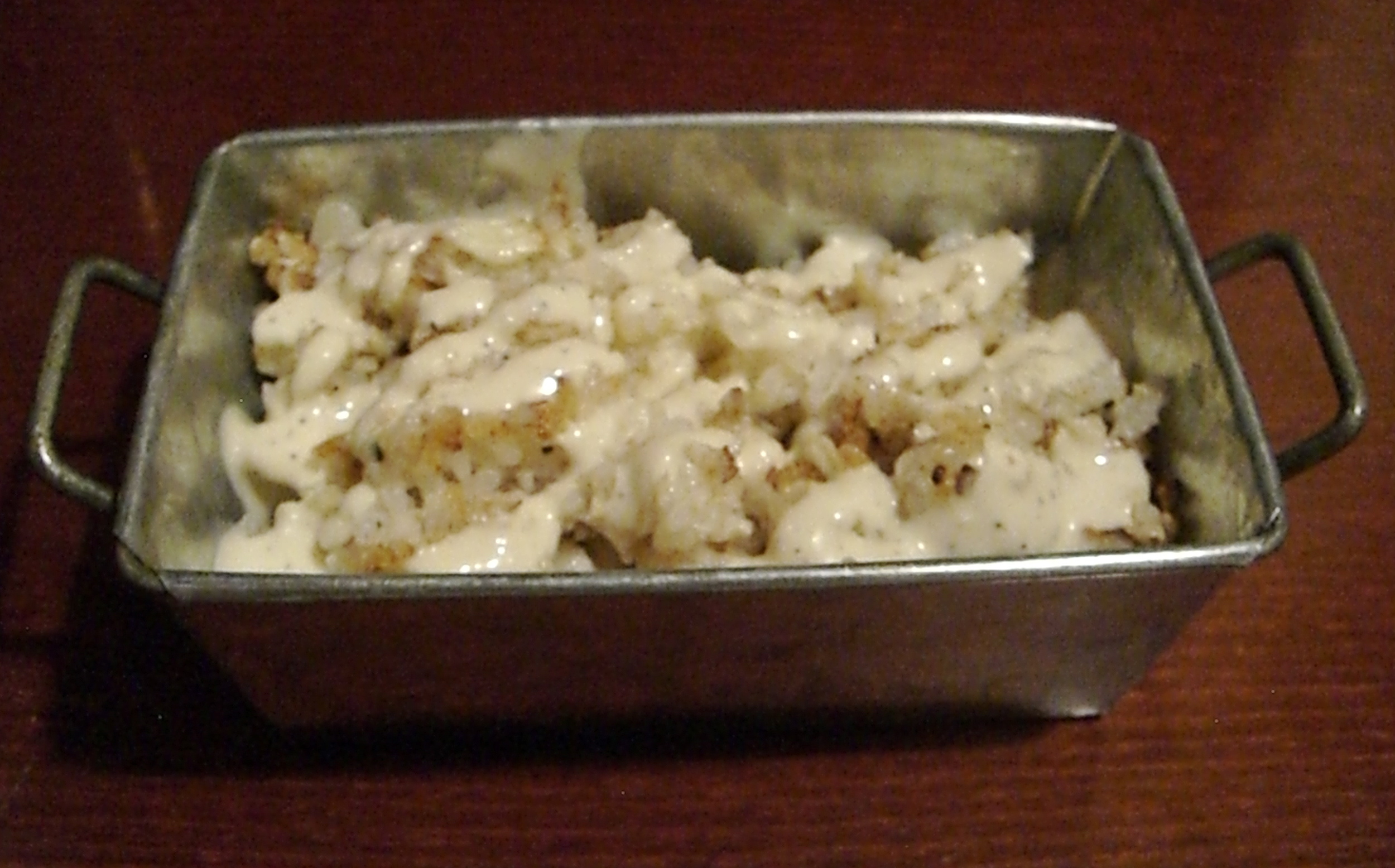 This vegan cauliflower "rice" with truffle sauce was so delicious it could accompany any meal vegan or otherwise.