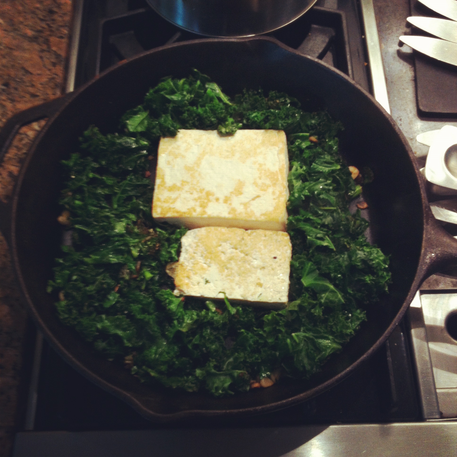 This breakfast of greens and tofu and sprouted toast is vegan and delicious.