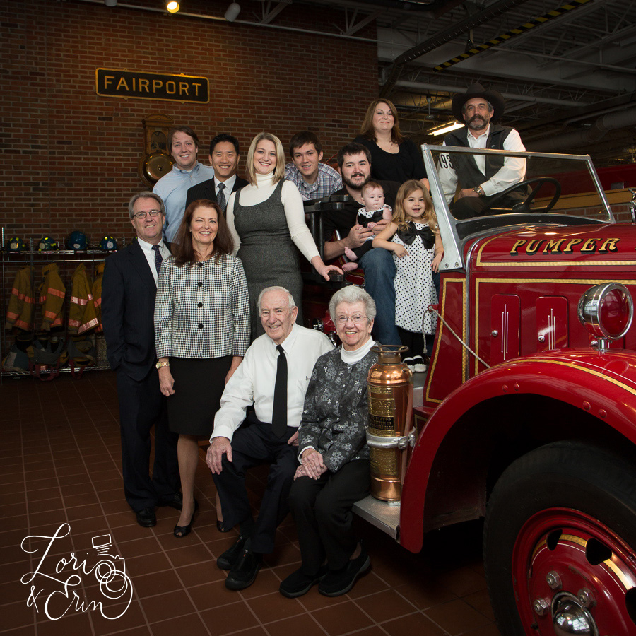big family with fire truck