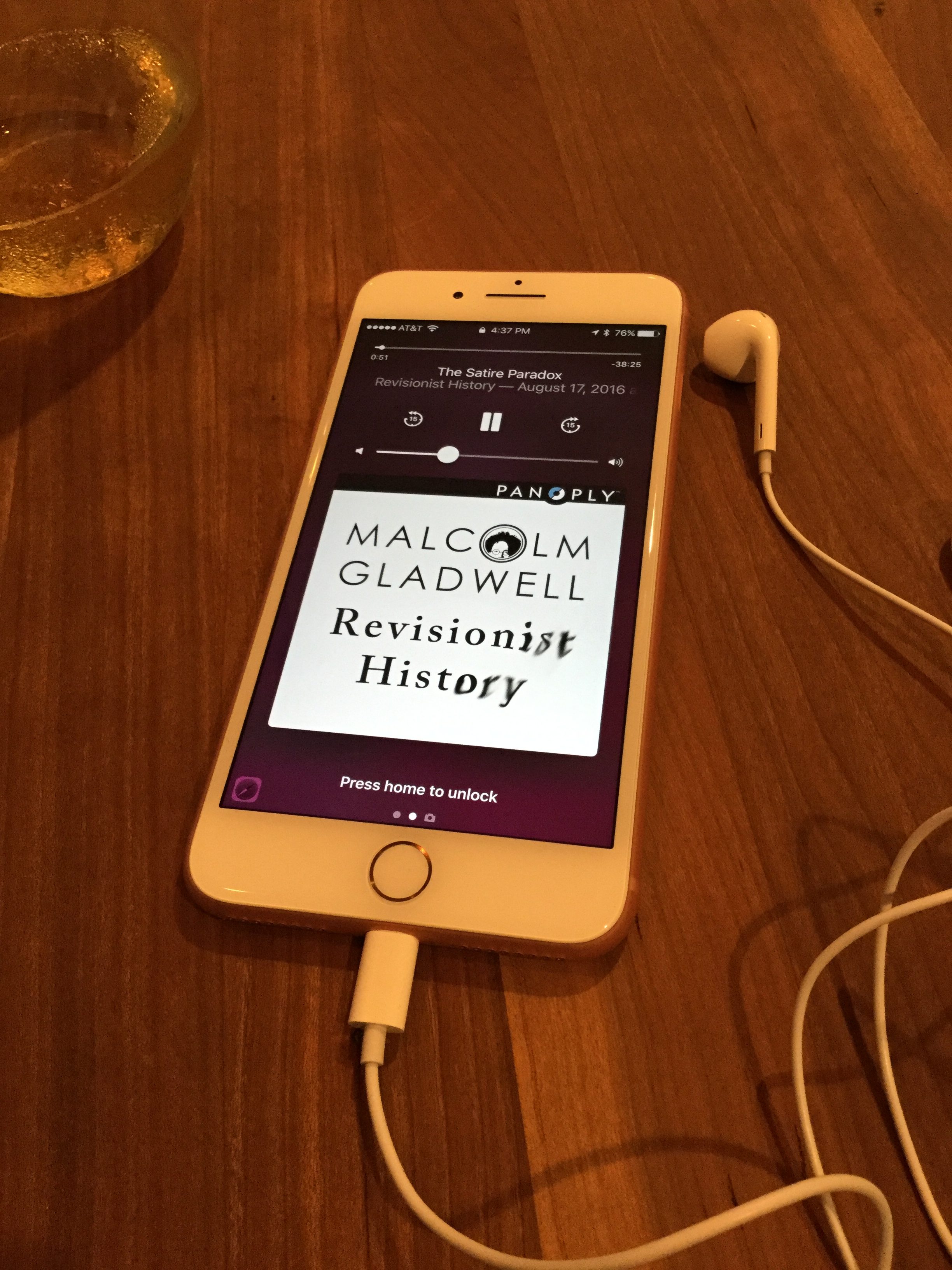 revisionist history podcast playing on an iphone 7 plus