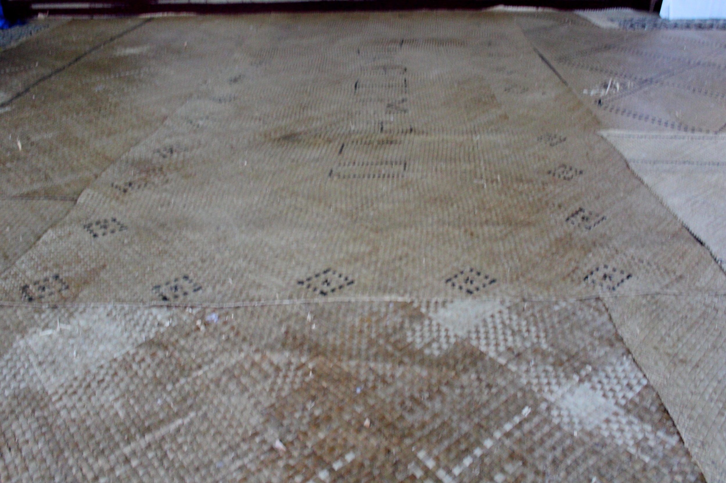 Woven mats covering the floor