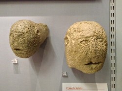 Replicas of the St Piran Oratory carved heads on display at the Royal Cornwall Museum (women on left, man on the right) (credit: Tom Goskar, reproduced by kind permission of the Royal Cornwall Museum)