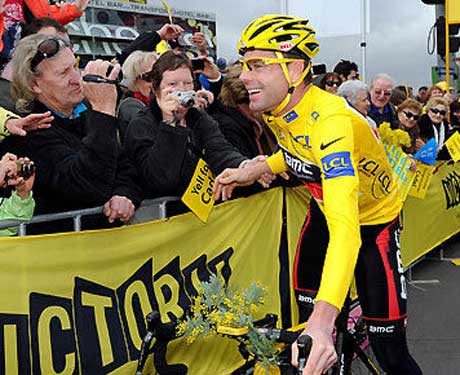 As cyclist Cadel Evans rode toward his ‘Cadelebration’ in Federation Square at Melbourne following his success in Le Tour de France 2011, he carried a small bunch of wattle on his handlebars. Photography by Mal Fairclough