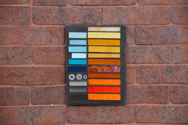 color palette on the brick wall