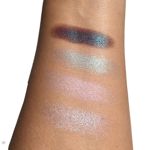 Swatches from Top to Bottom: Dreamer, Splash, Pink Pearl, Coconut. Press Play below to see the swatches in action. They are so sparkly and shimmery. This short clip captures what the camera could not. 